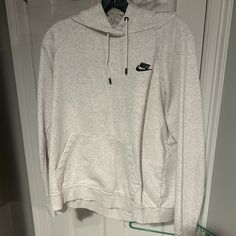 Size Large Never Worn. Nike Casual Sweatshirt With Drawstring Hood, Cozy Nike Hoodie With Drawstring Hood, Nike Casual Long Sleeve Hoodie, Nike White Sweater For Winter, White Nike Sweater For Winter, Nike Casual Hoodie With Adjustable Hood, Nike Casual Hoodie With Drawstring Hood, Casual Nike Hoodie With Adjustable Hood, Nike Tech Fleece Grey