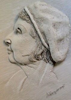 a drawing of a woman's head with a white hat on top of it