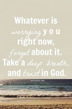 a quote on the beach saying whatever is worrying you right now, forget about it take a deep breath and trust in god