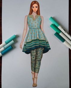 a drawing of a woman in a green dress and leggings next to crayons