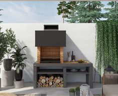 an outdoor fireplace and grill in the middle of a patio with potted plants on either side