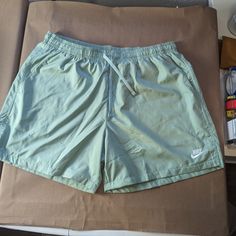 Brand: Nike Waist: 17.5" Hips: 25" Thigh: 16" Leg Opening: 14.5" Inseam: 5.5" Rise: 14" Length: 17" Color: Light Green Condition: New With Tags Used Items May Have Signs Of Wear. However, I Try My Best To Include Plenty Of Photos To Help Buyers See Any Issues/Damage/Or Wear Found On The Items. If You Have Questions, Please Reach Out Before Sending An Offer Or Purchasing An Item. I Value Your Time And Want To Make Sure You Are Completely Aware Of What You Are Purchasing. All Sales Are Shipped Out Casual Green Swim Trunks With Built-in Shorts, Nike Summer Shorts With Moisture-wicking, Nike Moisture-wicking Shorts For Summer, Nike Moisture-wicking Short Swim Trunks, Nike Swim Trunks With Built-in Shorts, Nike Relaxed Fit Athletic Shorts For Summer, Nike Summer Moisture-wicking Shorts, Nike Moisture-wicking Shorts For Swimming, Nike Moisture-wicking Swim Trunks