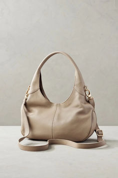 A stylish, medium-sized hobo bag for busy days, the Zamora tucks away your wallet, keys, makeup, and more in a beautiful crescent shape. Hobo Tote Bag, Crescent Shape, Leather Hobo Bag, Essential Items, Leather Hobo, Hobo Bag, Magnetic Closure