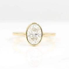 The Stevie Ring (Oval) in Yellow Gold with Lab Grown Diamond against a white background Bezel Engagement Ring With Wedding Band, Pear Shapes, Oval Engagement Ring, Bezel Engagement Ring, Double Diamond, Oval Moissanite, Oval Engagement, Vintage Style Rings, Band Jewelry