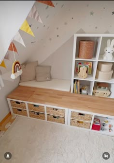 a child's room with toys and bookshelves