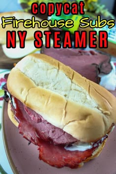 a close up of a sandwich on a plate with text overlay that reads copycat firehouse sub ny steamer