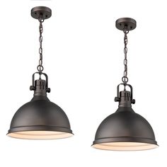 two pendant lights hanging from the ceiling