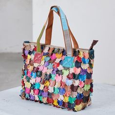 Item Code: 2212717330494Item Type: Tote Bag,Shoulder BagGender: WomenStyle: Fashion,CasualMain Material: LeatherLining Material: PolyesterClosure Type: ZipperPattern Type: FloralPopular Elements: SplicedApplicable Occasions: Party, Engagement Anniversary ,Vacation Gift,Traveling.Number of Handles/Straps: two handles,one strapPS:We adopt the top leather,each bag is limited edition.There may be a little different in the color and the leather grains.Length: 33.00 cm/ 12.99 "Width: 13.00 cm/ 5.12 "Height: 29.00 cm/ 11.42 "Handles Height: 22.00 cm/ 8.66 " Fashion Tote Bag, Leather Floral, Avant Garde Fashion, Floral Decoration, Wardrobe Style, Colored Leather, Engagement Anniversary, One Piece Swimwear, Bag Shoulder