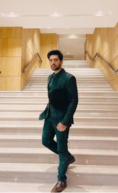 a man standing on some steps in a building