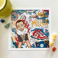 a card with an image of a man on it and some candy next to it