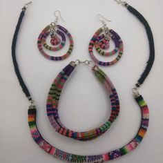 Handmade Set Of Earrings And Bracelet With Collected Blanket That Is Used By Peruvian Artisans From The City Of Cusco. These Earrings Are Made By Hand From Peruvian Blanket Fabric. Circle-Shaped Ethnic Earrings Adjustable Multicolor Fair Trade Earrings, Adjustable Round Multicolor Jewelry Sets, Multicolor Festival Bangle Jewelry, Rainbow Festival Bracelet Jewelry, Traditional Multicolor Fair Trade Jewelry, Handmade Yellow Bangle Jewelry, Fair Trade Bracelet Jewelry For Festivals, Adjustable Multicolor Dangle Jewelry, Fair Trade Festival Bracelet Jewelry