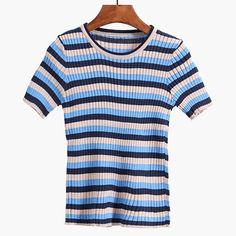 Stretchy ribbed shirt with colorful stripes. One size fits S-L Up to 15" across shoulders 25"-35" chest 7" sleeve length 21" length Cheap Ribbed Striped T-shirt, Spring Striped Color Block T-shirt, Spring Striped T-shirt With Rainbow Print, Striped Long Sleeve Stretch T-shirt, Stretch Striped Short Sleeve T-shirt, Ribbed Shirt, 2 Colours, Color Blocking, Blue Color