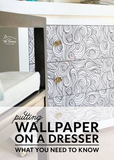 Wrapping dresser drawers is a great way to update a dingy piece of furniture without the mess of paint. But before you dive in, get all the answers to your wallpaper questions in this (VERY) comprehensive guide. Wallpaper Chest Of Drawers, Malm Dresser Wallpaper, Dresser Makeover With Wallpaper, Dresser With Wallpaper Drawers, Wallpaper Furniture Diy Dressers, Wallpaper On Dresser Drawers, Dresser Makeover Wallpaper, Contact Paper Dresser, Wallpaper Dresser Drawers