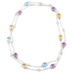 Amazing, Unique 14k White Gold Chain Necklace Features Amber, Blue, and Lilac-Colored Briolette-Cut Topaz in Alternating Pattern w/ Flower-Shaped Stations Set with a Round-Cut Diamond. Each Briolette Station is Set with Eight Small Round-Cut Diamonds Total Length = 37" Each Briolette Station Approximately 23 mm Long Each Flower Station Approximately 11 mm Long Total Topaz Weight = Approximately 67 carats Total Diamond Weight = Approximately .50 carats Chain Ideas, White Gold Chain, White Gold Chains, Lilac Color, Diamond Gold, Multi Strand Necklace, Gold Chain Necklace, Green Stone, Multi Strand