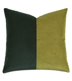 a green and yellow pillow on a white background