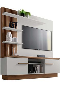 an entertainment center with shelves and a flat screen tv mounted on it's wall