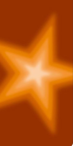 an orange and white background with a star in the center, as if it were blurred or blurry