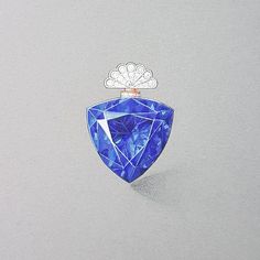 a blue diamond shaped brooch with a white crown on it's back end