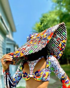 "Keep it cute and chic in our \" Massive Oversized Floppy Kente Print Sun Hat\" this season. This is a one size fits all, lightweight, durable and uniquely sewn hat made from high quality African Ankara print. This hat may help keep your face shaded from the sun as you embark on a full day outdoors and it is sure to turn heads wherever you choose to wear it to. The possibilities are endless with this beautiful well constructed hat! It's the perfect look for your summer vacation, baecation, weeke Fitted Straw Hat With Curved Brim For Beach, White Beachwear Hat For Poolside, Fitted Sun Hat With Upf 50+ And Curved Brim, Fitted Wide Brim Sun Hat With Upf 50+, Wide Brim Sun Hat For Beachwear, Playful Sun Hat For Beach Vacation, Playful Sun Hat For Beach Season Vacation, Fitted Wide Brim Straw Hat For Vacation, Fitted Wide Brim Hats For Vacation