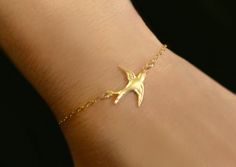 "Dainty Dove Bird Charm Bracelet - Gold or Silver A dainty flying bird makes for such a cute layering bracelet! - Adorable bird is 17mm and is either 16k gold plated or tarnish resistant rhodium silver - Chain is a sparkling 14k gold filled or sterling silver - Bracelet is adjustable - choose your size during checkout - Bracelet attaches with a 14k gold filled or sterling silver spring clasp See matching necklaces here: https://www.etsy.com/listing/127251978/small-bird-necklace-tiny-bird-charm h Dove Bracelet, Heart Shaped Diamond Pendant, Bird Bracelet, Minimalist Necklace Silver, Pave Heart Necklace, Petite Necklace, Dove Necklace, Simple Silver Jewelry, Silver Jewelry Diy