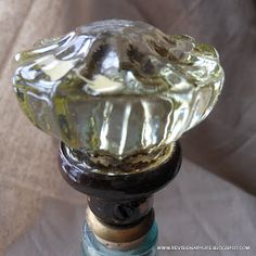 a close up of a glass door knob