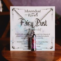 Our Fairy Dust Spell Jar Amulet Necklace contains a powerful blend of rose quartz, amethyst, rose petals, blue cornflowers, and fairy dust glitter, each chosen for their mystical properties. It is accompanied by a silver fairy charm. Handcrafted with care and intention, this unique piece serves as a beacon of connection to the fairy realm. Stainless Steel 20 inch chain. Vial is 1.5" in length.  If you would like the spell jar necklace without the charm, or would like a different charm, message u Spiritual Pink Charm Necklace As Gift, Pink Spiritual Charm Necklace For Gift, Spiritual Pink Charm Necklace For Gift, Purple Fairycore Jewelry For Gifts, Fairycore Purple Jewelry As A Gift, Fairycore Purple Necklace For Gift, Purple Fantasy Necklace For Gift, Fantasy Style Purple Necklace For Gift, Magical Silver Crystal Necklace For Gift