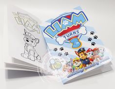 an open children's book with paw patrol coloring pages