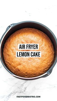 an air fryer lemon cake in a pan with the words, air fryer lemon cake