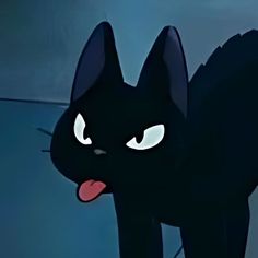 a black cat with glowing eyes and tongue sticking out