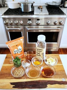 the ingredients for this recipe are displayed on a cutting board in front of an oven