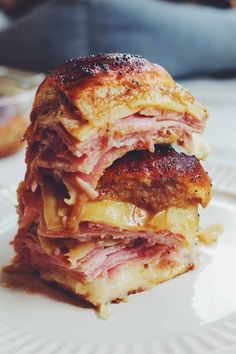 a stack of food sitting on top of a white plate