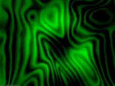 an abstract green and black background with wavy lines