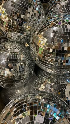 several disco balls are stacked on top of each other