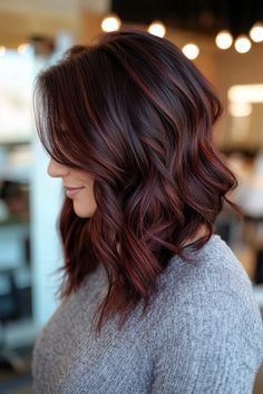 24 Stunning Winter Hair Color Ideas For Brunettes Auburn Hair With Platinum Highlights, Women Fall Hair Color, Trending Highlights Hair Colors 2024, Warm Chocolate Brown Hair Color, Cute Winter Hair Colors, Dark Brown With Red Hair, Fall Winter Hair Color 2024, Dark Brown Hair Balayage Winter, Winter Hair 2024