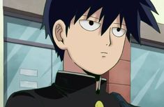 an anime character with black hair and white eyes looking at something in front of him