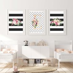 three framed pictures hang on the wall above a crib in a white room with pink and black decor