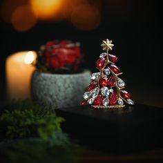 a small christmas tree sitting on top of a table