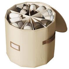 a large round storage container filled with shoes