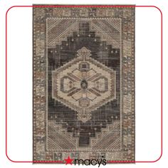 a rug with an intricate design on the front and back side, in grey tones