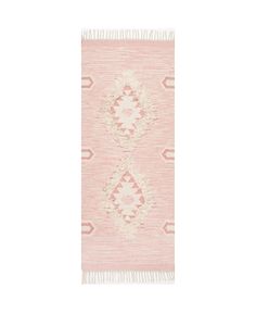 a pink and white rug with fringes