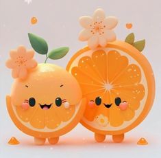 two oranges with faces and flowers on them