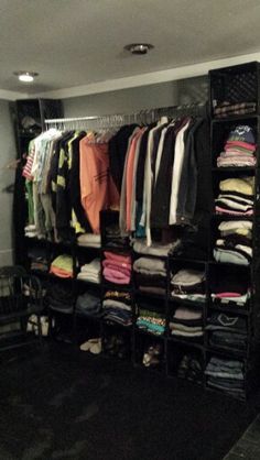 the closet is full of clothes and shoes for all kinds of people to use it