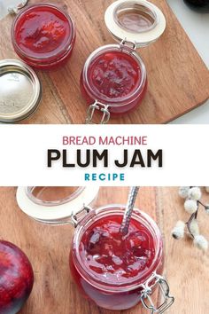 two jars filled with plum jam sitting on top of a wooden cutting board