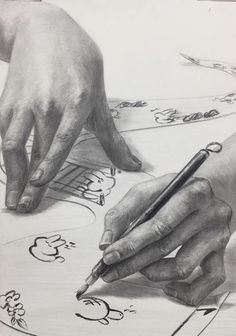 two hands are drawing on paper with a pen and pencil, while another hand is pointing at something