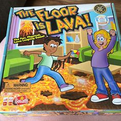 the floor is lava board game in its box