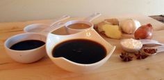 an assortment of food items on a wooden table