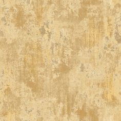 an old, dirty wallpaper with yellow and brown paint on the top right corner