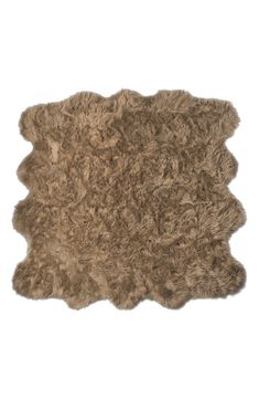 an animal fur rug is shown on a white background with no image in the middle