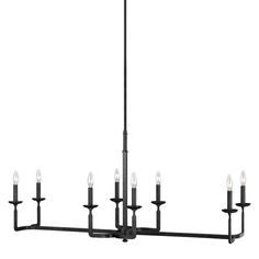 a black chandelier with six candles hanging from the bottom and four lights on each end