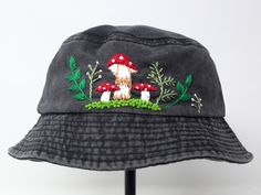 Item: mushroom embroidered bucket hat Material: 100% cotton Size: one size fits most Embroidery: hand made with acrylic thread Free first class shipping, upgradable priority mail service. 30 days return policy, feel confident at your purchase! Embroidered Adjustable 5-panel Hat, Adjustable Embroidered 5-panel Hat, Handmade Cotton Hats For Outdoor, Handmade Cotton Outdoor Hats, Whimsical Cotton Cap, Novelty Outdoor Bucket Hat, Handmade Short Brim Bucket Hat For Outdoor, Casual Embroidered 5-panel Hat, Handmade Outdoor Bucket Hat